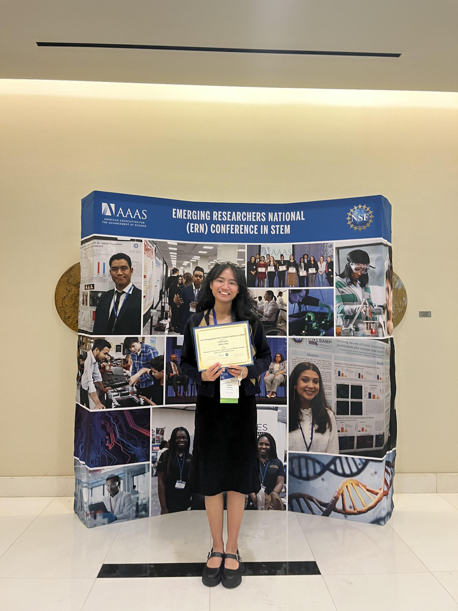 Camille Catolos shows off her certificate after winning 3rd place in the Computer Science and Information Management, and Data Science Poster Presentation, at the 2024 Emerging Researchers National (ERN) Conference in STEM. Her poster described her CCI project in Summer 2023 with Mentor Dani Ushizima. (Photo credit: Princess Johanna Eusantos).